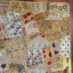 Handcrafted gold patchwork tapestry. Lays flat. Hang or drape it. 38.5” x 57”